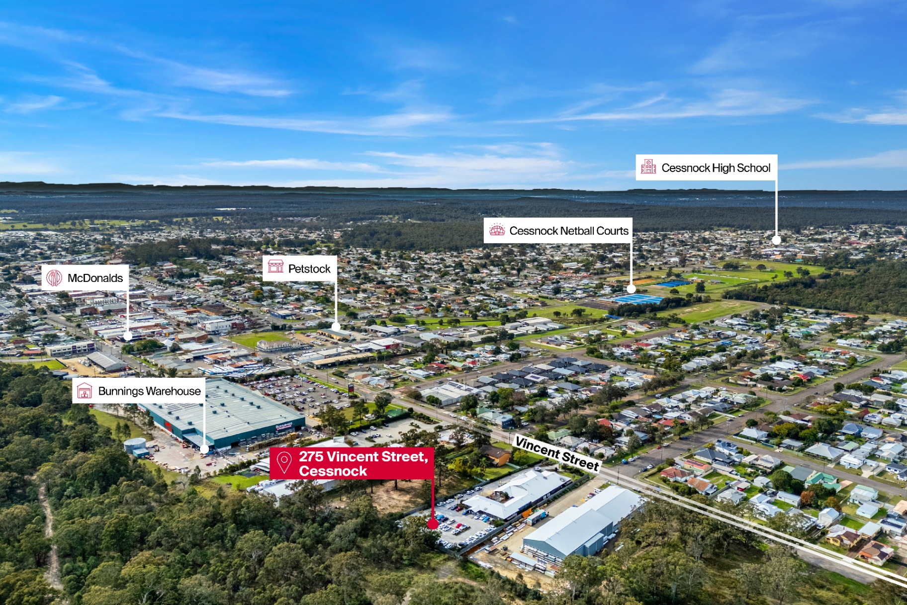 Aerial view of 275 Vincent Street, Cessnock with surrounding amenities including Bunnings Warehouse, McDonalds, Petstock, Cessnock Netball Courts and Cessnock High School